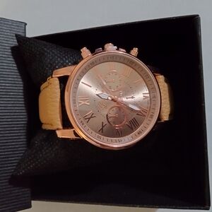 Rose Gold Chronograph Watch with Tan Leather Strap